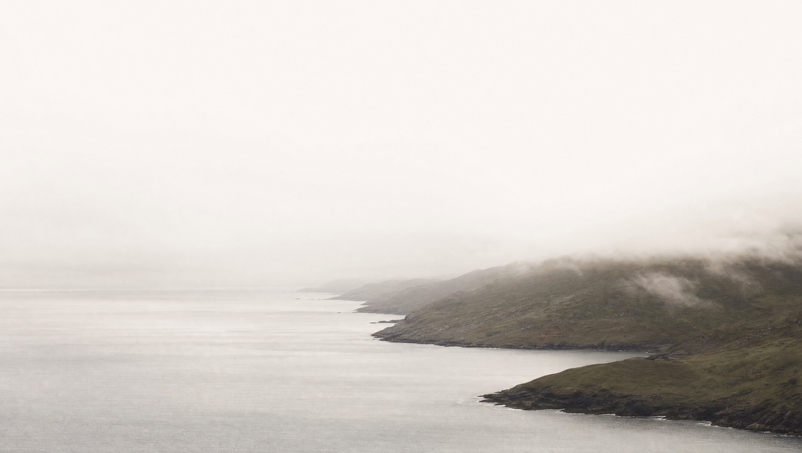 The Atlantic meeting the Kerry coastline under white fog